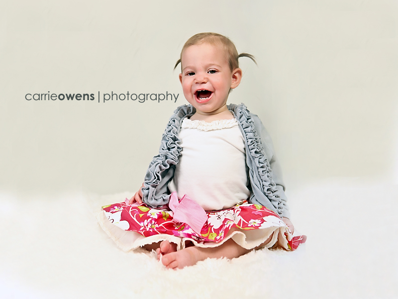 sandy utah photographer captures smiling one year old girl
