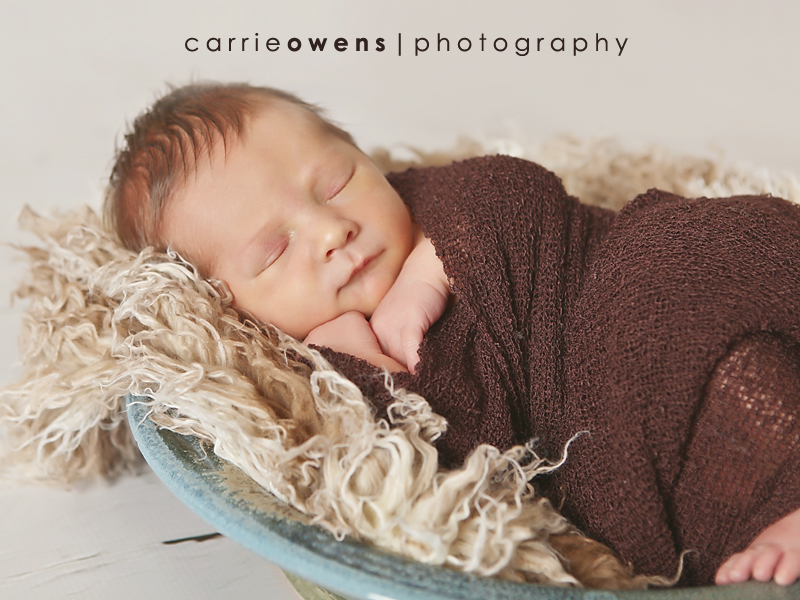 Newborn Photography in Salt Lake City Utah closeup of baby in pottery by newborn photographer Carrie Owens