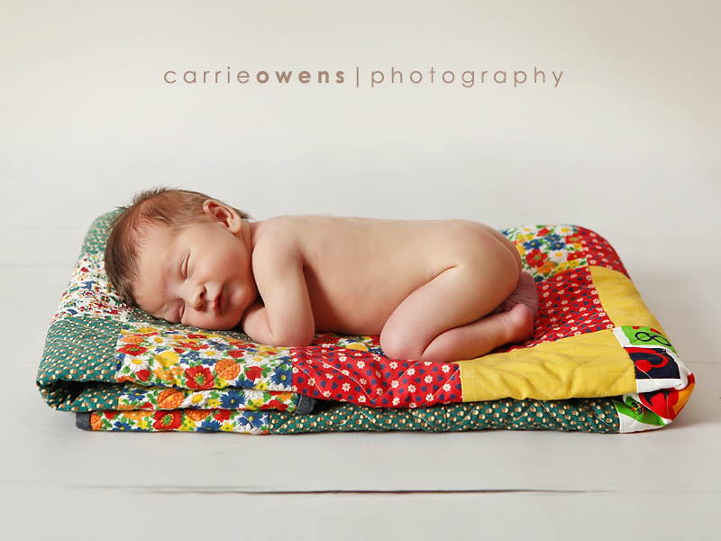 Newborn Photography in Salt Lake City Utah baby on handmade quilt by newborn photographer Carrie Owens