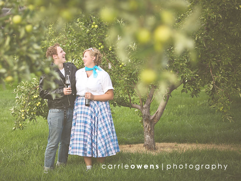 salt lake city utah engagement photographer Carrie Owens captures stylish couple in an orchard in 50s themed shoot