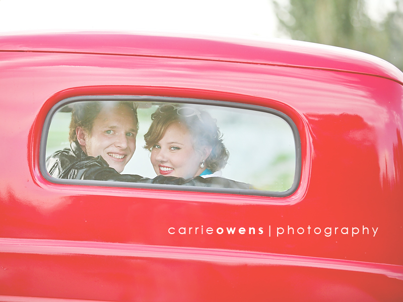 salt lake city utah engagement photographer Carrie Owens captures stylish couple in their back truck window in 50s themed shoot