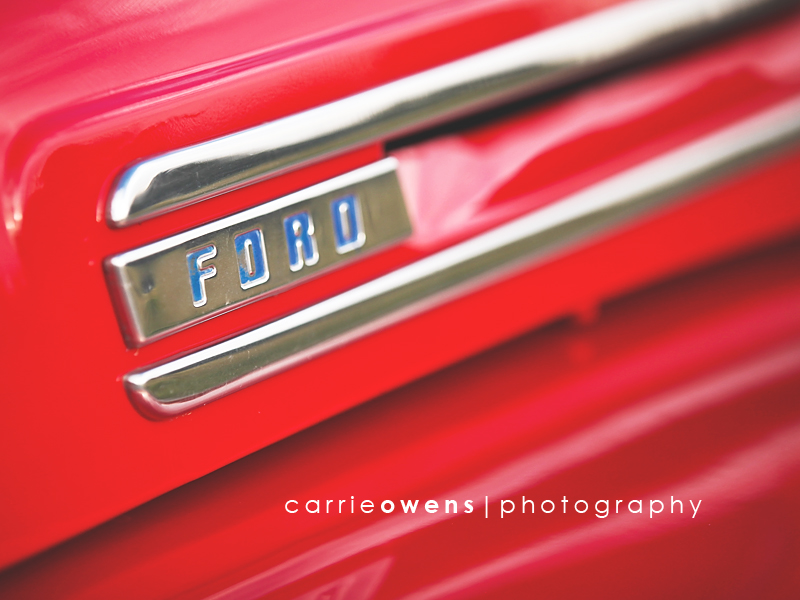 salt lake city utah engagment photographer Carrie Owens captures ultra close up of old red truck at a 50s themed engagement shoot