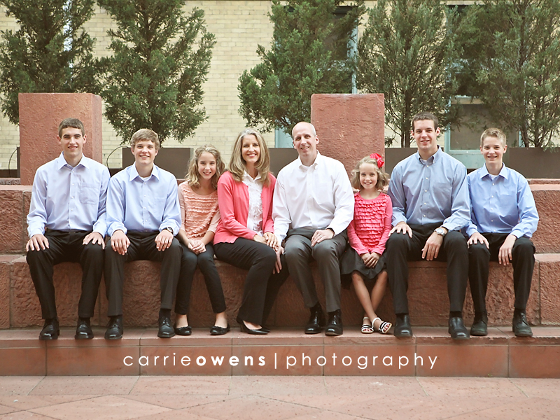 salt lake city utah family photographer Carrie Owens captures family of eight downtown on wall