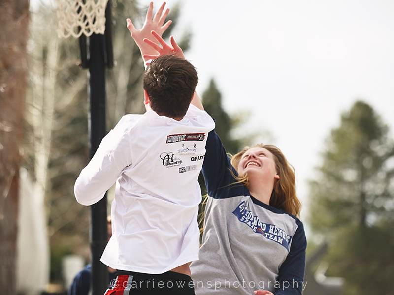 Salt Lake City Utah child and family photographer Carrie Owens photographs her children playing basketball