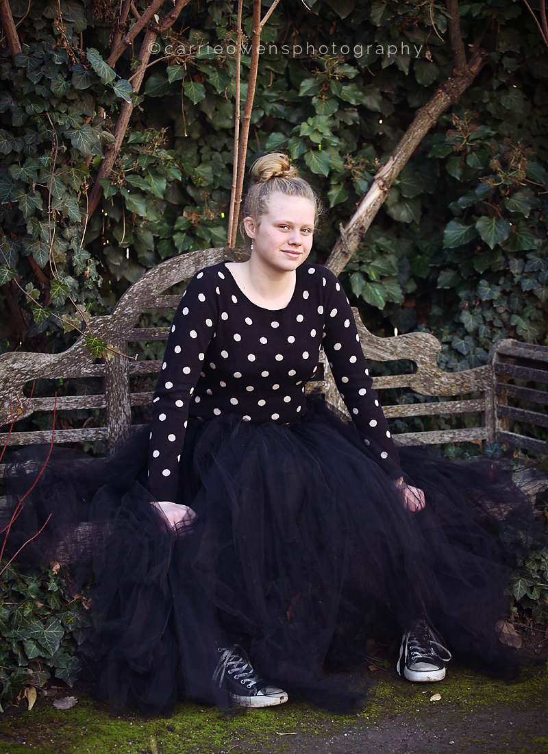 Salt Lake City Utah tween photographer Carrie Owens photographs girl in black tulle skirt and polka dot swetaer
