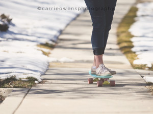Salt Lake City Utah tween photographer Carrie Owens photographs girl with her skateboard