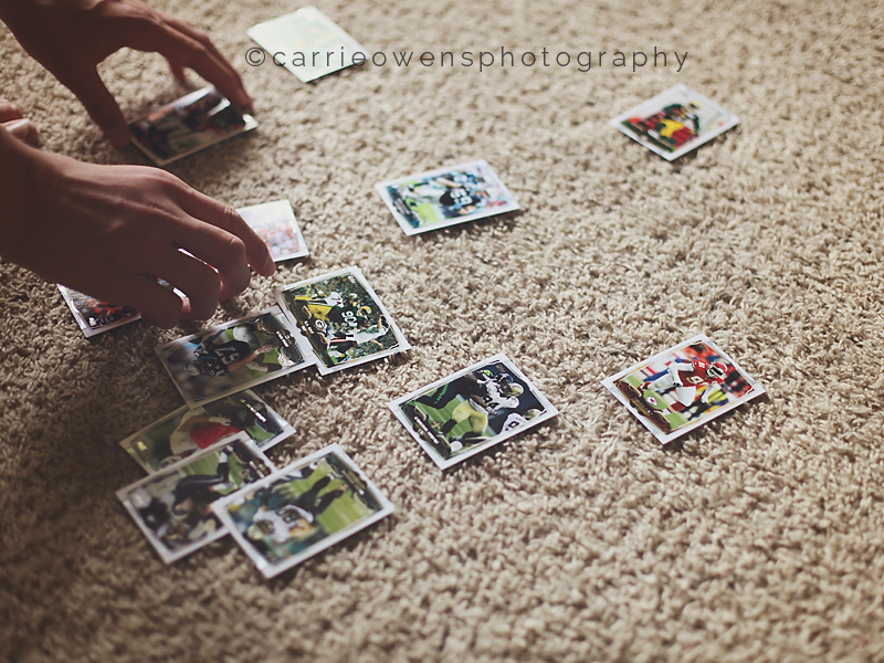 Salt Lake City teen photographer Carrie Owens photographs her teen son with his football cards