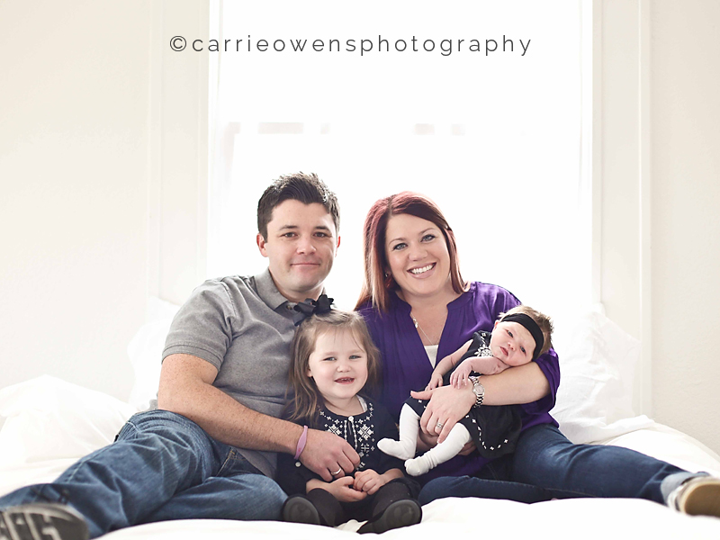 Salt Lake City Utah newborn photographer Carrie Owens photographs newborn girl and her family in the studio