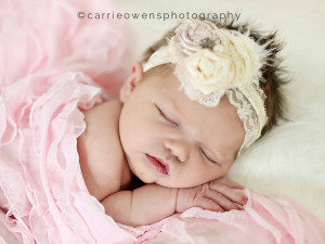 Salt Lake City Utah newborn photographer Carrie Owens photographs newborn girl and her family in the studio