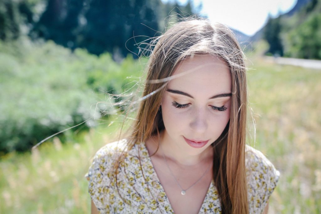 Salt Lake City Utah high school senior photographer Carrie Owens photographs brunette in the canyons